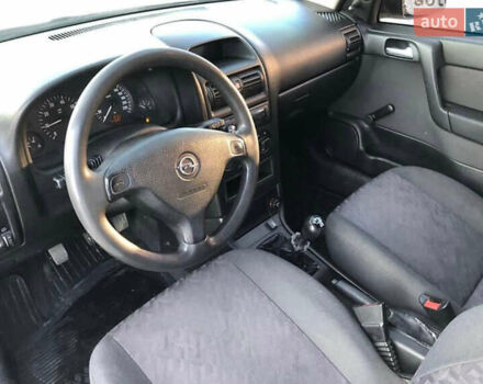 Серый Опель Астра, объемом двигателя 1.6 л и пробегом 244 тыс. км за 3000 $, фото 9 на Automoto.ua