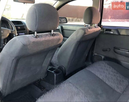 Серый Опель Астра, объемом двигателя 1.6 л и пробегом 244 тыс. км за 3000 $, фото 13 на Automoto.ua