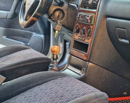 Серый Опель Астра, объемом двигателя 2 л и пробегом 398 тыс. км за 2350 $, фото 11 на Automoto.ua