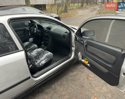 Серый Опель Астра, объемом двигателя 1.6 л и пробегом 257 тыс. км за 3500 $, фото 12 на Automoto.ua