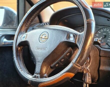 Серый Опель Астра, объемом двигателя 2 л и пробегом 398 тыс. км за 2250 $, фото 9 на Automoto.ua