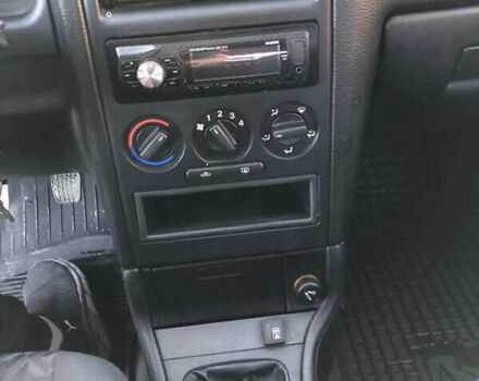 Серый Опель Астра, объемом двигателя 1.6 л и пробегом 244 тыс. км за 3000 $, фото 12 на Automoto.ua