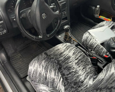 Серый Опель Астра, объемом двигателя 1.6 л и пробегом 257 тыс. км за 3500 $, фото 11 на Automoto.ua