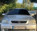 Серый Опель Астра, объемом двигателя 2 л и пробегом 300 тыс. км за 3000 $, фото 1 на Automoto.ua