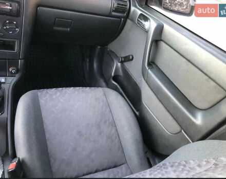 Серый Опель Астра, объемом двигателя 1.6 л и пробегом 244 тыс. км за 3000 $, фото 11 на Automoto.ua