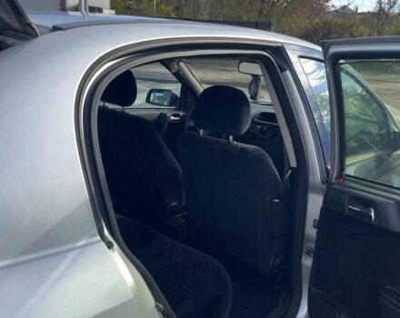 Серый Опель Астра, объемом двигателя 2 л и пробегом 288 тыс. км за 1400 $, фото 12 на Automoto.ua