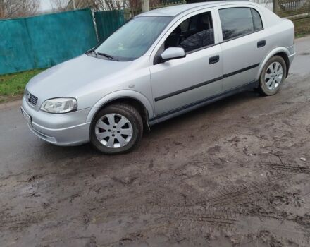 Серый Опель Астра, объемом двигателя 1.2 л и пробегом 249 тыс. км за 2400 $, фото 4 на Automoto.ua