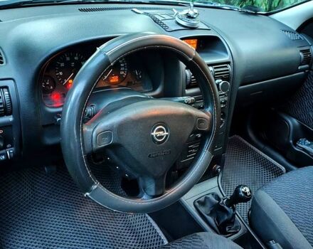 Серый Опель Астра, объемом двигателя 1.6 л и пробегом 180 тыс. км за 4730 $, фото 6 на Automoto.ua