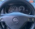 Серый Опель Астра, объемом двигателя 1.6 л и пробегом 374 тыс. км за 3200 $, фото 9 на Automoto.ua