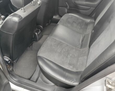 Серый Опель Астра, объемом двигателя 1.2 л и пробегом 249 тыс. км за 2400 $, фото 8 на Automoto.ua