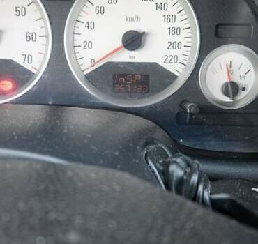 Серый Опель Астра, объемом двигателя 2.2 л и пробегом 267 тыс. км за 2900 $, фото 4 на Automoto.ua