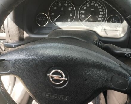 Серый Опель Астра, объемом двигателя 1.6 л и пробегом 200 тыс. км за 1919 $, фото 4 на Automoto.ua