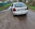 Серый Опель Астра, объемом двигателя 1.2 л и пробегом 249 тыс. км за 2400 $, фото 2 на Automoto.ua