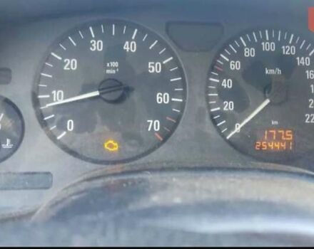 Серый Опель Астра, объемом двигателя 1.6 л и пробегом 254 тыс. км за 2050 $, фото 4 на Automoto.ua