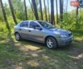 Серый Опель Астра, объемом двигателя 1.4 л и пробегом 285 тыс. км за 3500 $, фото 1 на Automoto.ua