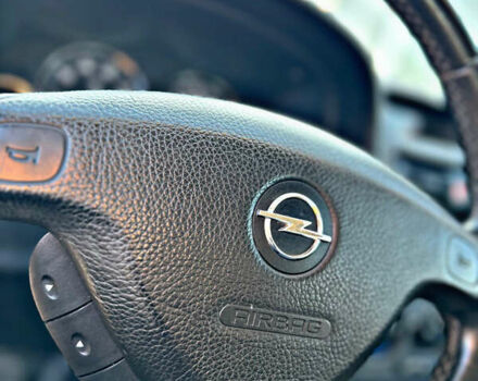 Серый Опель Астра, объемом двигателя 1.6 л и пробегом 110 тыс. км за 2800 $, фото 39 на Automoto.ua