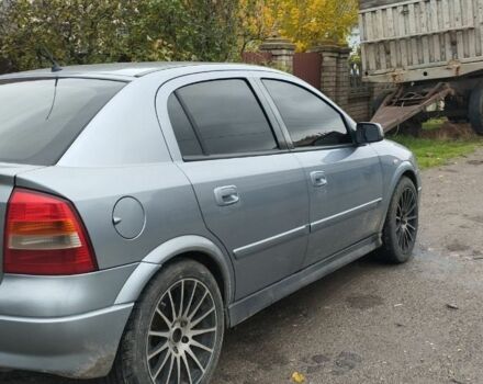 Серый Опель Астра, объемом двигателя 2 л и пробегом 245 тыс. км за 1200 $, фото 2 на Automoto.ua