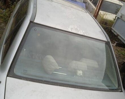 Серый Опель Астра, объемом двигателя 0 л и пробегом 230 тыс. км за 450 $, фото 3 на Automoto.ua