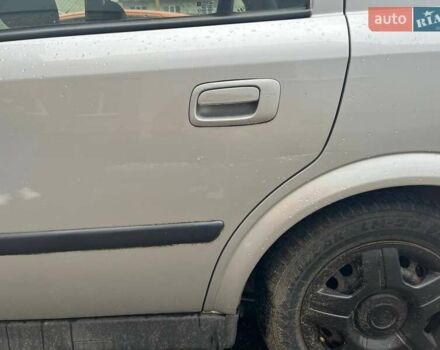 Серый Опель Астра, объемом двигателя 1.6 л и пробегом 110 тыс. км за 3600 $, фото 11 на Automoto.ua