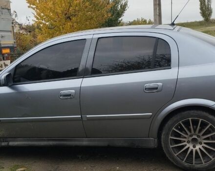 Серый Опель Астра, объемом двигателя 2 л и пробегом 245 тыс. км за 1200 $, фото 1 на Automoto.ua