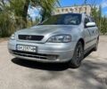 Серый Опель Астра, объемом двигателя 1.4 л и пробегом 200 тыс. км за 2300 $, фото 1 на Automoto.ua