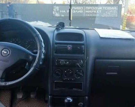 Серый Опель Астра, объемом двигателя 1.6 л и пробегом 254 тыс. км за 2050 $, фото 3 на Automoto.ua