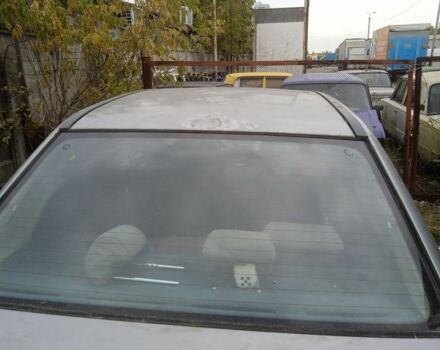 Серый Опель Астра, объемом двигателя 0 л и пробегом 230 тыс. км за 450 $, фото 5 на Automoto.ua