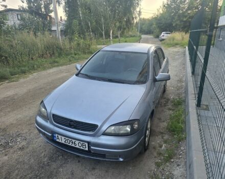 Серый Опель Астра, объемом двигателя 2 л и пробегом 297 тыс. км за 3800 $, фото 1 на Automoto.ua