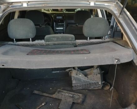 Серый Опель Астра, объемом двигателя 2 л и пробегом 245 тыс. км за 1200 $, фото 4 на Automoto.ua