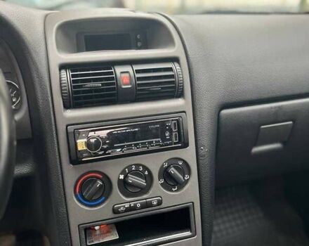 Серый Опель Астра, объемом двигателя 1.6 л и пробегом 110 тыс. км за 3600 $, фото 10 на Automoto.ua