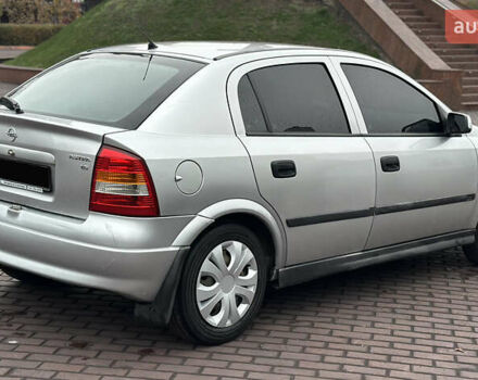 Сірий Опель Астра, об'ємом двигуна 1.6 л та пробігом 295 тис. км за 3999 $, фото 9 на Automoto.ua