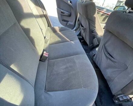 Серый Опель Астра, объемом двигателя 1.6 л и пробегом 279 тыс. км за 4550 $, фото 5 на Automoto.ua