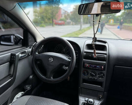 Серый Опель Астра, объемом двигателя 1.6 л и пробегом 183 тыс. км за 4100 $, фото 19 на Automoto.ua