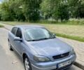 Серый Опель Астра, объемом двигателя 1.4 л и пробегом 330 тыс. км за 2400 $, фото 1 на Automoto.ua