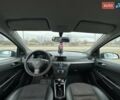 Серый Опель Астра, объемом двигателя 1.4 л и пробегом 255 тыс. км за 4000 $, фото 4 на Automoto.ua