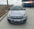 Серый Опель Астра, объемом двигателя 1.4 л и пробегом 255 тыс. км за 4000 $, фото 1 на Automoto.ua