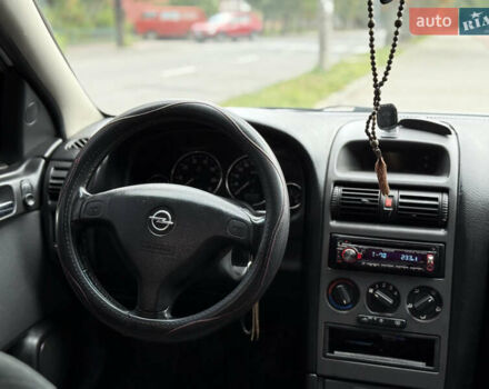 Серый Опель Астра, объемом двигателя 1.6 л и пробегом 183 тыс. км за 4100 $, фото 20 на Automoto.ua