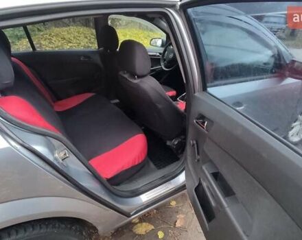 Серый Опель Астра, объемом двигателя 1.4 л и пробегом 327 тыс. км за 4400 $, фото 19 на Automoto.ua