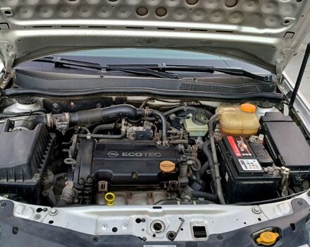 Серый Опель Астра, объемом двигателя 1.4 л и пробегом 172 тыс. км за 5500 $, фото 7 на Automoto.ua