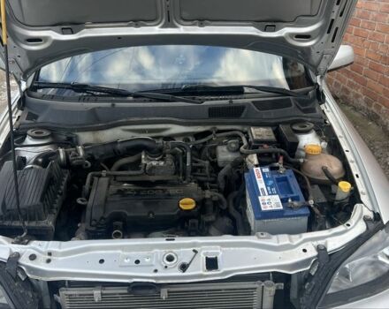 Серый Опель Астра, объемом двигателя 1.4 л и пробегом 200 тыс. км за 4000 $, фото 3 на Automoto.ua