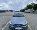 Серый Опель Астра, объемом двигателя 1 л и пробегом 226 тыс. км за 5500 $, фото 1 на Automoto.ua