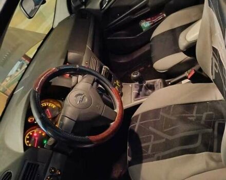 Сірий Опель Астра, об'ємом двигуна 1.4 л та пробігом 129 тис. км за 4000 $, фото 7 на Automoto.ua