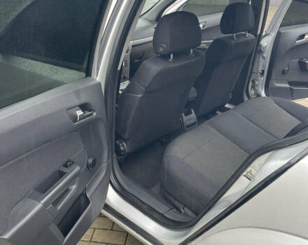 Серый Опель Астра, объемом двигателя 1.6 л и пробегом 140 тыс. км за 3899 $, фото 9 на Automoto.ua