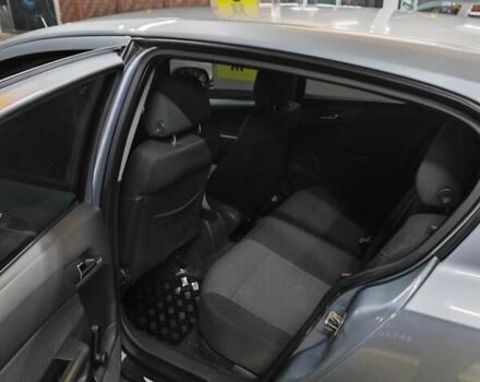 Серый Опель Астра, объемом двигателя 1.4 л и пробегом 257 тыс. км за 4499 $, фото 3 на Automoto.ua