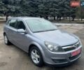 Серый Опель Астра, объемом двигателя 1.8 л и пробегом 164 тыс. км за 5600 $, фото 1 на Automoto.ua