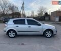 Серый Опель Астра, объемом двигателя 1.4 л и пробегом 220 тыс. км за 3450 $, фото 7 на Automoto.ua