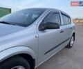 Серый Опель Астра, объемом двигателя 1.4 л и пробегом 220 тыс. км за 3450 $, фото 9 на Automoto.ua