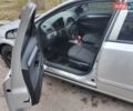 Сірий Опель Астра, об'ємом двигуна 1.6 л та пробігом 141 тис. км за 4000 $, фото 9 на Automoto.ua