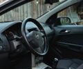 Серый Опель Астра, объемом двигателя 1.4 л и пробегом 243 тыс. км за 4500 $, фото 6 на Automoto.ua