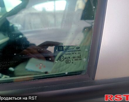 Серый Опель Астра, объемом двигателя 1.4 л и пробегом 246 тыс. км за 4700 $, фото 7 на Automoto.ua